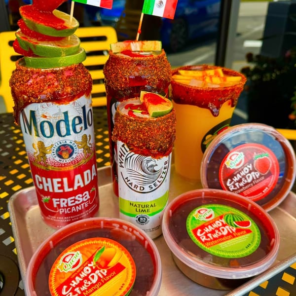 Mexican drinks and chamoy dips on a tray, including a Modelo Chelada and White Claw seltzer.